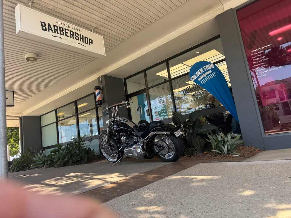 A motorbike parked outside Golden Four’s Tugun shopfront
